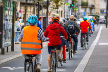 Cyclists On The Bike Path Along The Seine In Paris. France