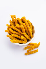 Wall Mural - Bhajni chakli sticks or crunchy murukku snack made using diwali festival, favourite munching food