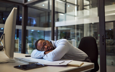 Canvas Print - Night business, work sleep and businessman sleeping at desk with computer in dark office at a corporate company. Tired African manager or employee with burnout taking a nap while working overtime