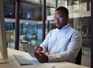 Poster - Black businessman, tablet and data analysis with computer in night office for digital marketing software, cybersecurity code or kpi. Thinking programmer, developer or website designer with technology