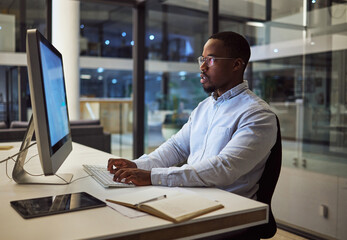 Aufkleber - Businessman typing on computer with internet analytics in an office at night. Professional entrepreneur send email, doing online research, analysis and reading report trying to reach work deadline