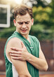© C Coetzee/peopleimages.com - Muscle injury, basketball or sport pain and man with emergency arm accident during game on an outdoor court. Professional athlete with medical problem during training and exercise for sport match