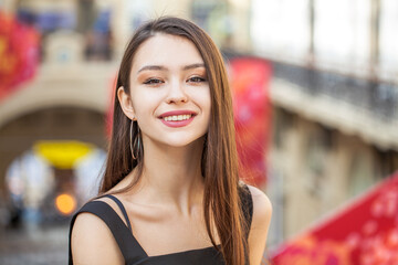 Wall Mural - Close up portrait of a young beautiful woman