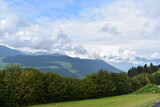 Fototapeta Góry - Alpen-Wolken-Tal-Himmel