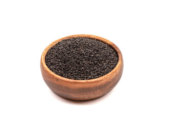 Sesame seeds in a wooden bowl over white background.