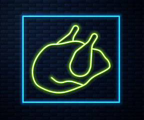 Sticker - Glowing neon line Roasted turkey or chicken icon isolated on brick wall background. Vector