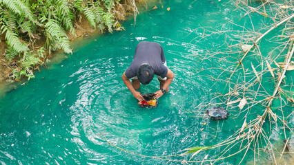 The river is polluted, the color of the water changes