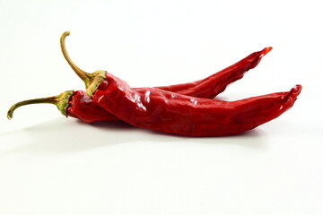 dry organic kashmiri red chili pepper well known for dark red color food recepi in indian gujarati food isolated on white background,selective focus