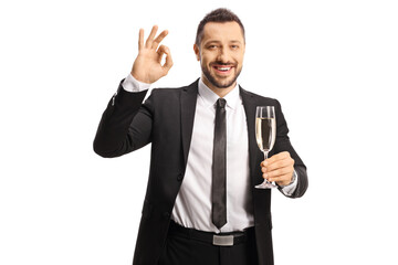 Poster - Businessman holding a glass of champagne and gesturing good sign