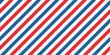 © Icons-Studio - Vintage barber seamless pattern. White, blue and red diagonal lines stripe texture. Vector illustration.