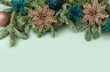 Christmas holiday background with copy space for text. Fir tree branches with Christmas balls frame.