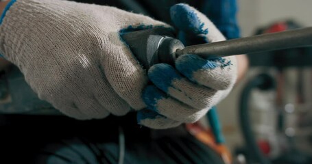 Poster - Hammer drill against tile backdrop.