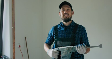 Sticker - Satisfied worker performs home bathroom demolition, general apartment renovation with hammer, tile chipping, construction worker with experience.