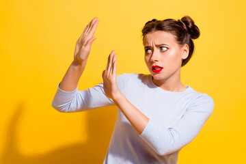 Wall Mural - photo of anxious frustrated lady frightened horror ignore with palms look empty space isolated brigh