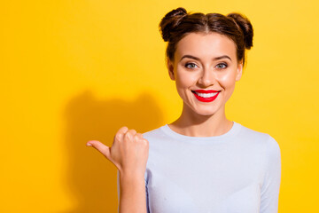 Wall Mural - Portrait of positive cheerful lady point empty space indicate offer promotion isolated vivid color background