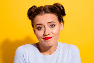 Wall Mural - photo of funny young female don't know what to do feel hesitant doubtful isolated on yellow color ba