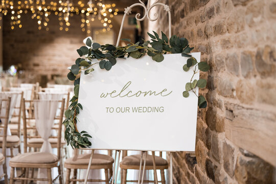 Welcome to our wedding rustic sign with no names on wooden easel stand