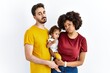 © Krakenimages.com - Interracial young family of black mother and hispanic father with daughter looking sleepy and tired, exhausted for fatigue and hangover, lazy eyes in the morning.