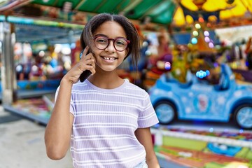 Poster - African american girl smiling happy at the town fair speaking on the phone