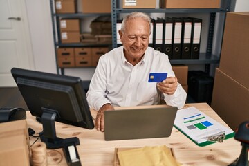 Poster - Senior man ecommerce business worker using laptop and credit card at office