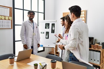 Wall Mural - Group of young doctor people discussing in a medical meeting at the clinic office.