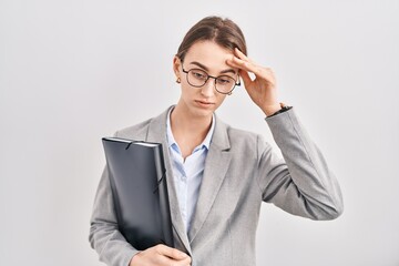 Sticker - Young caucasian woman wearing business clothes and glasses worried and stressed about a problem with hand on forehead, nervous and anxious for crisis