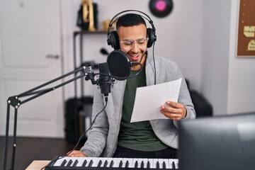 Sticker - African american man artist singing song at music studio