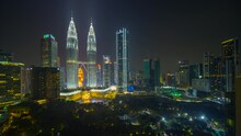 Timelapse From Dusk To Night At Kuala Lumpur Capital City Centre, Featuring The Landmark Petronas Twin Towers.