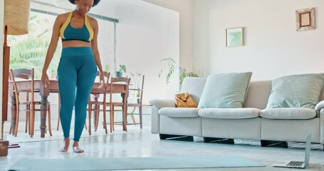 Canvas Print - Yoga, fitness and laptop with a woman following an online workout class for exercise, health and wellness. Training, healthy and water with a young female athlete exercising on the living room floor