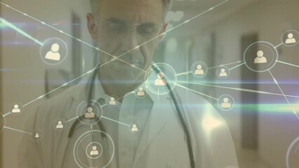 Poster - Animation of network of connections with icons over caucasian male doctor with tablet