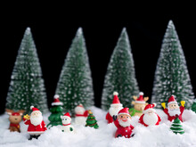 Santa Claus On White Snow With Blur Christmas Tree Background,Card Or Poster For Merry Christmas And Happy New Year 2023 Concept,Free Space For Presentation,Celebration Xmas Decoration Festive Holiday