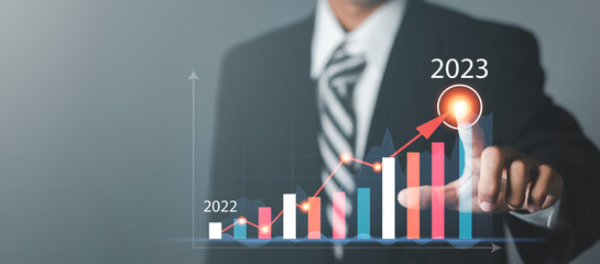 Business planning, analysis and development company Future growth 2022 to 2023. businessman calculates financial data for long-term investments.