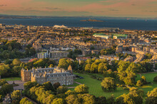 Holyrood Palace And Leith At Sunset.