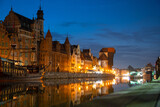 Fototapeta Niebo - Picturesque summer evening panorama of the architectural pier of the Old Town GDANSK, POLAND