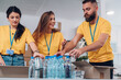 © Zamrznuti tonovi - Group of volunteers working in community charity donation center