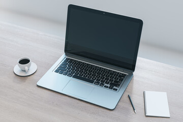 Aufkleber - Close up of empty laptop on wooden desktop with coffee cup, notepad, pen, mock up place on screen, blurry background. 3D Rendering.