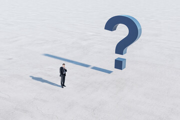 Poster - Answer concept with confused man in black suit and blue question mark on concrete surface