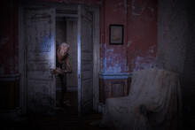 Boogeymen Monster Creeping Through Doorway In Old Abandoned Haunted House. Halloween Horror Concept 3d Illustration.