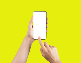Poster - Mobile phone screen mockup in hand, finger pressing, clicking on vertical white blank display on yellow