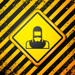 Wall Mural - Black Nuclear power plant worker wearing protective clothing icon isolated on yellow background. Nuclear reactor worker. Warning sign. Vector