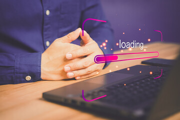 Poster - Man using laptop for download software and waiting to loading digital business data form website, concept of waiting for load of loading bar.