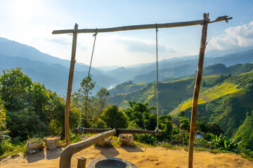 Aerial view of golden rice terraces at Mu cang chai town near Sapa city, north of Vietnam. Beautiful terraced rice field in harvest season in Yen Bai, Vietnam