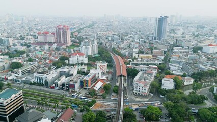 Wall Mural - Aerial view of train arriving at Juanda station