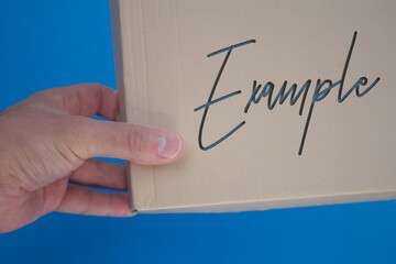Poster - Example word with cardboard box. Brown folded card box.