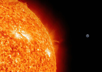 Wall Mural - accurate size comparison of earth and sun.