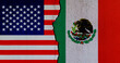 American and Mexican flags on broken cracked wall