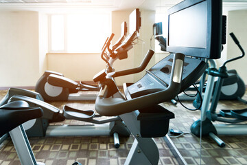 Canvas Print - Group of exercise bicycles in gym