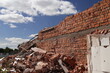 brick wall with a demolition of a building