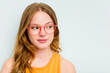 © Asier - Portrait of pretty young caucasian wearing glasses woman isolated on blue background