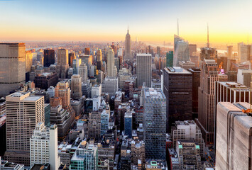 Wall Mural - Sunset aerial view of New York City looking over midtown Manhattan towards downtown.